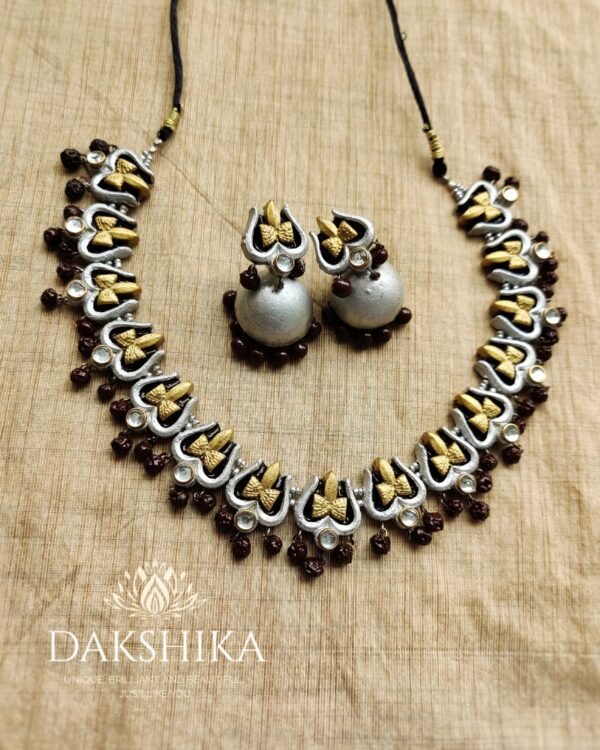 Thrissul-Short Necklace with Big Size Jhumka (Golden With Silver &Brown)