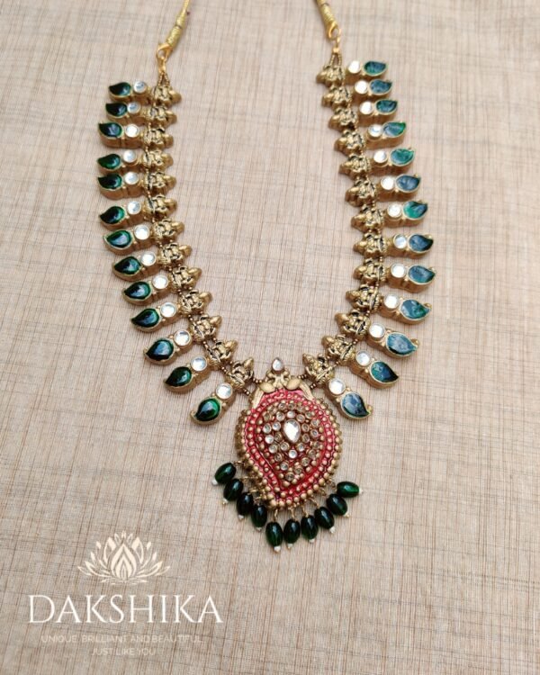 Palakka- Mid Length Necklace with Big Size Jhumka ( Golden with Green & Red) - Image 2