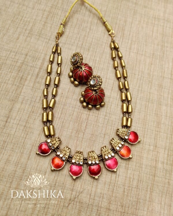 MADURI- Terracotta Medium Necklace with Big size jhumka ( Golden with Pink and Orange )