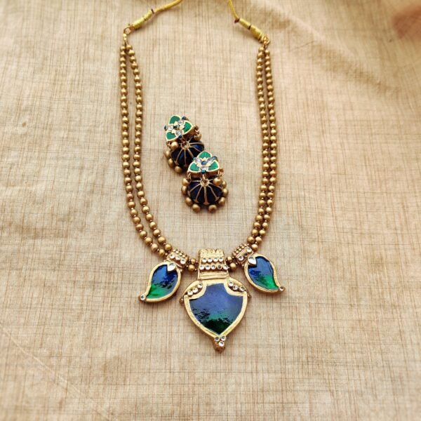 ANUPAMA - Terracotta short Necklace with medium size jhumka ( Golden with Blue and Green)