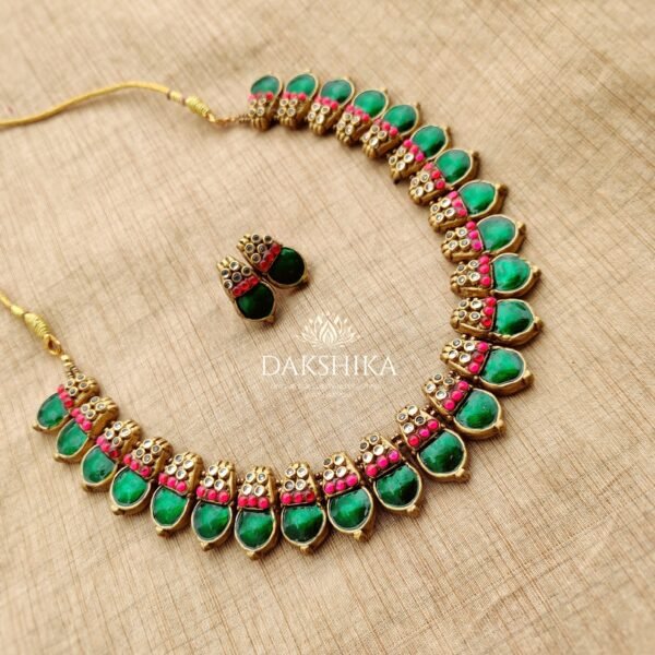ANUPAMA - Terracotta short Necklace with medium size earrings ( Golden with pink and Green)