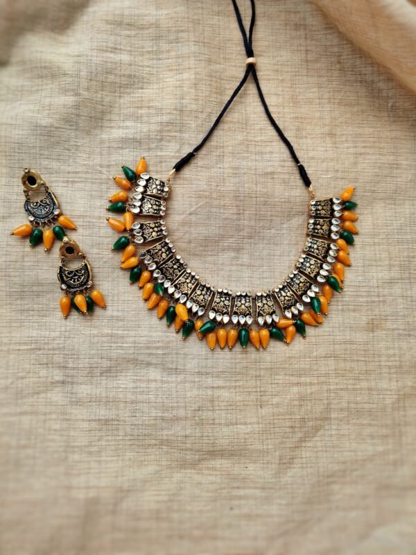 Chembaka- Terracotta Short Necklace with Medium size Earrings ( Golden with Yellow and Green)