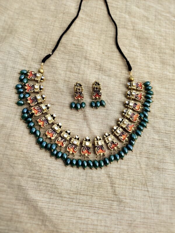 KADHARA- Terracotta Short Necklace with Small size Earrings ( Golden with orange and Green)
