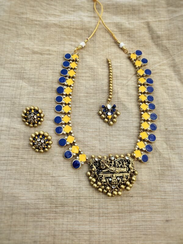 AANATHAM- Terracotta Long Necklace with Big size Earrings and Tikka ( Golden with Yellow and Blue)