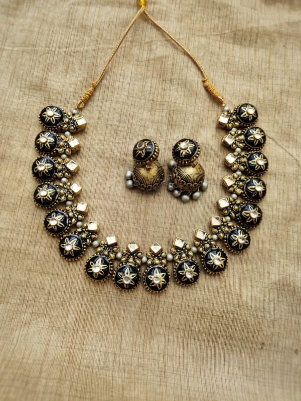 MALAR- Terracotta Short Necklace with Medium size jhumka ( Golden with Black and Silver)
