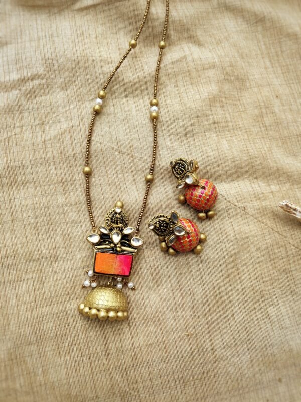 MATHANGI- Terracotta Long Necklace with Medium size jhumka ( Golden with Pink and Orange)