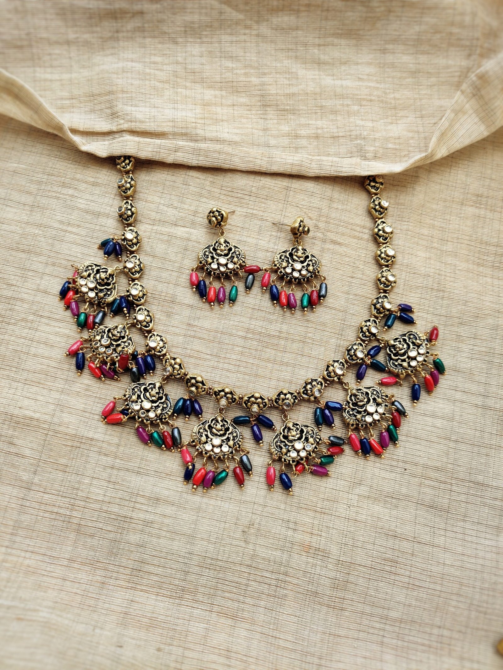 Ganesha- Terracotta Long Necklace with medium size Earrings ( Golden with Multi colour)