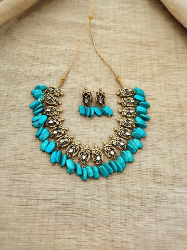 AMBUJAM- Terracotta Short Necklace with Small size Earring ( Golden with Sky Blue )