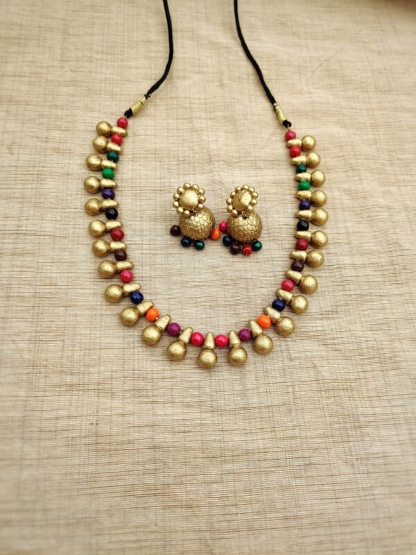MANJULA- Terracotta Short Necklace with Medium size jhumka ( Golden with Black and Red)