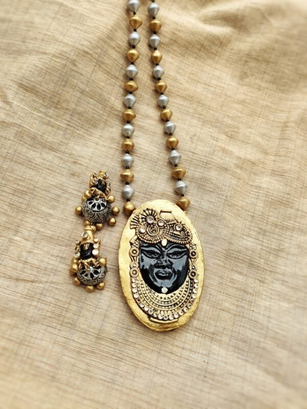 KRISHNA- Terracotta Long Necklace with Medium size jhumka ( Golden with Silver and Black )