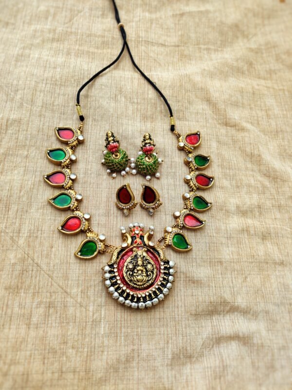 DEVI- Terracotta Medium Necklace with Big size jhumka and Earrings  ( Golden with Green and Red )