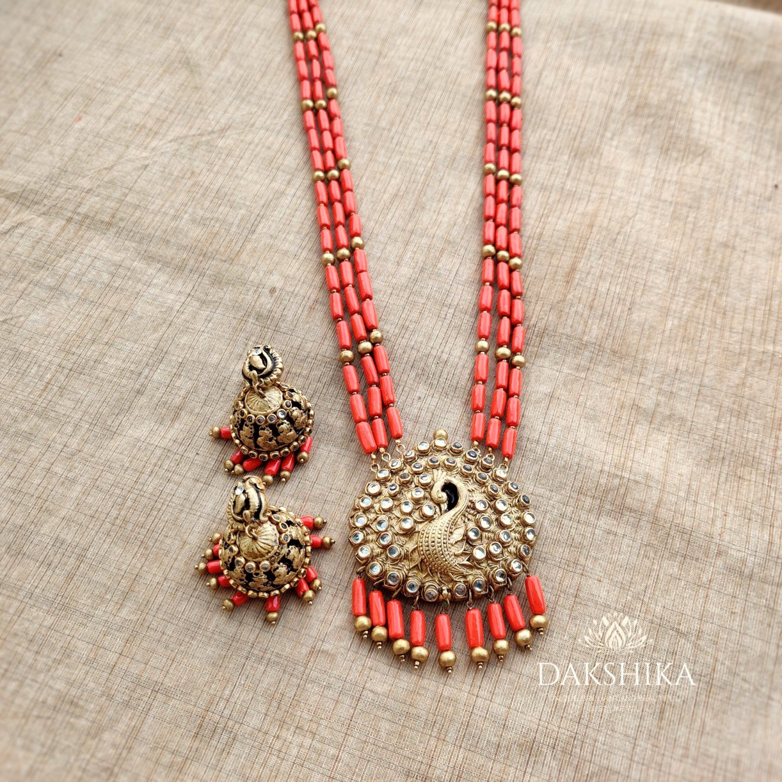 Mayoora- Long Necklace with Medium Size Jhumka ( Golden with Orange)